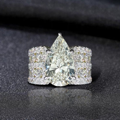 Multi Row Pave Solitaire Pear Cut White Sapphire Engagement Ring