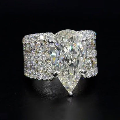 Multi Row Pave Solitaire Pear Cut White Sapphire Engagement Ring