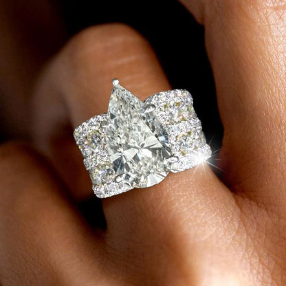 Multi Row Pave Solitaire Pear Cut White Sapphire Engagement Ring