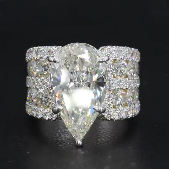 Multi Row Pave Solitaire Pear Cut White Sapphire Engagement Ring